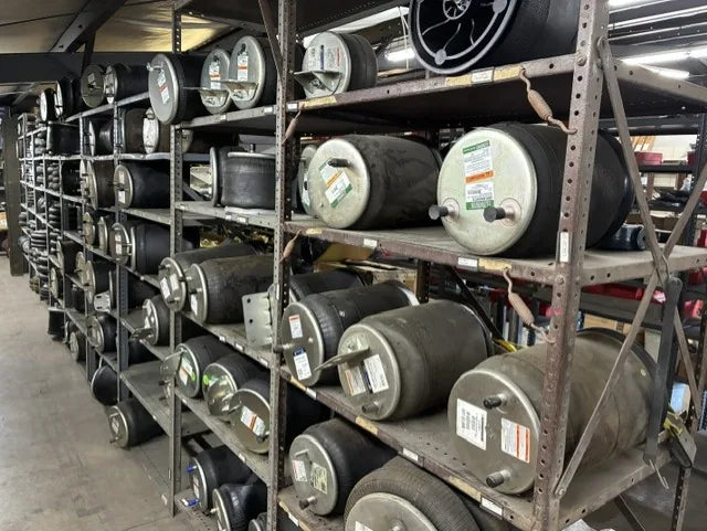 Commercial truck air-system components stocked on shelving at Johnson Truck & Trailer