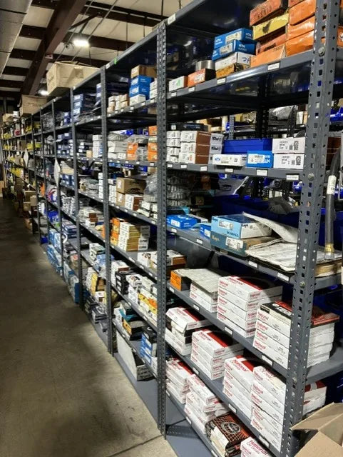 Aisle of heavy-duty replacement parts stocked at Johnson Truck & Trailer